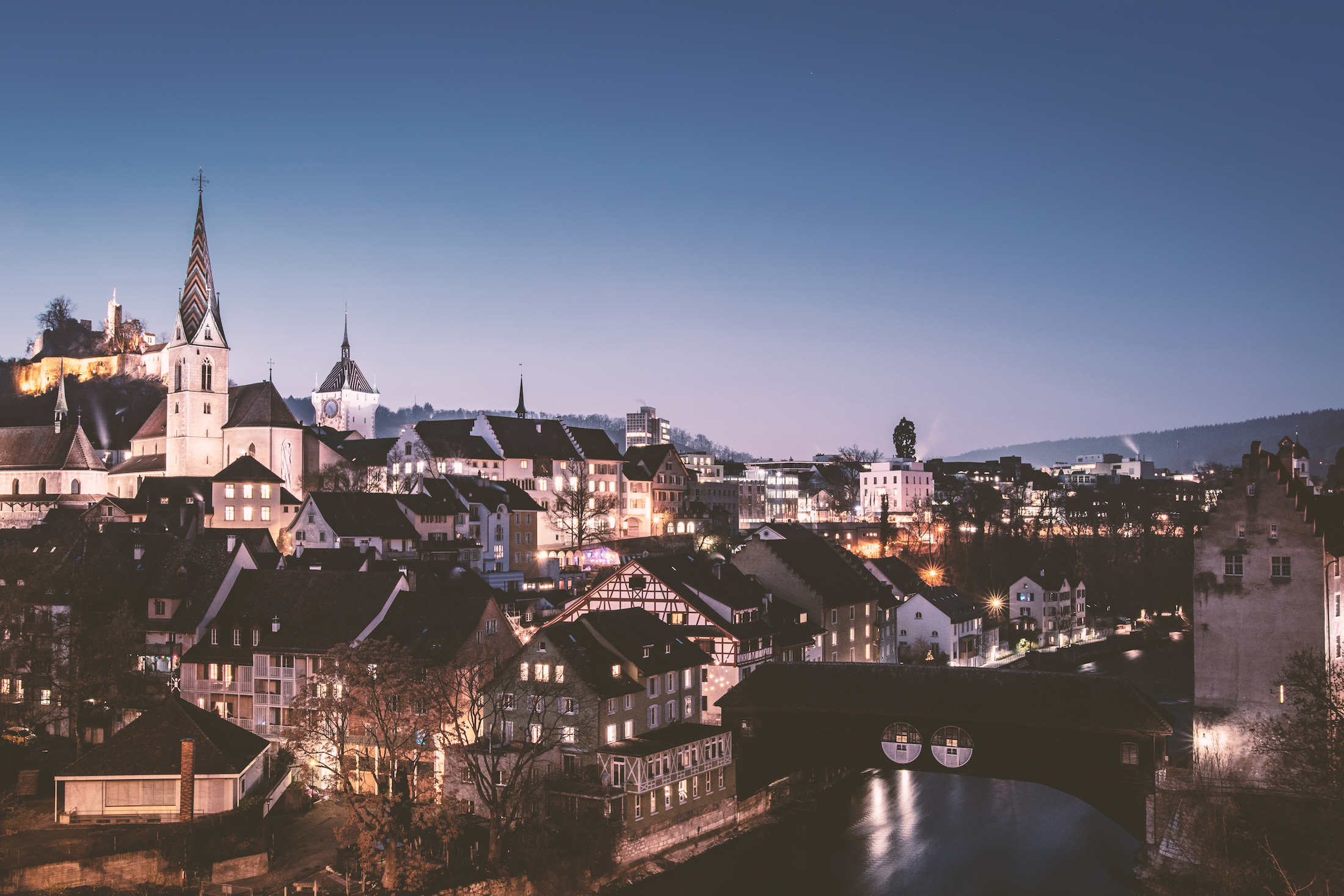 Switzerland dusk town lights